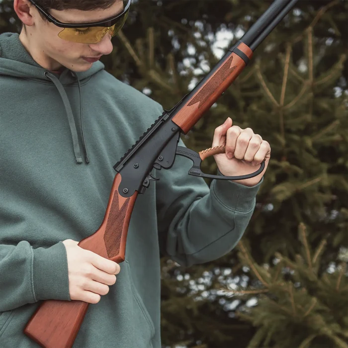 Winchester Model 1892 BB rifle cocking lifestyle picture
